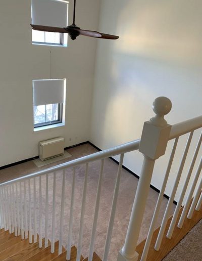 The Clarendon - Stairwell and Living Room
